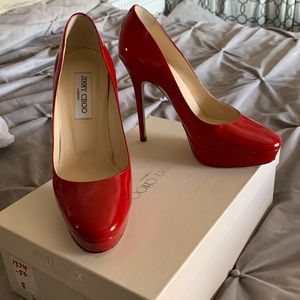 Size 38, red patent leather Jimmy Choo heels.